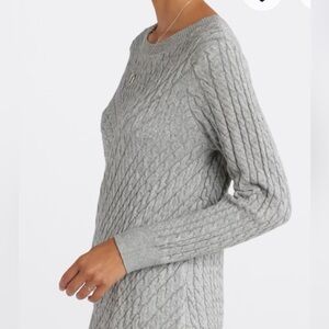 Grey Evikution by Cyrus Aneesa asymmetrical hem sweater.  Women’s size Medium